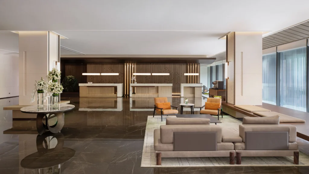 Luxury hotel lobby desk fit out custom timber hotel reception counter lounge seating area